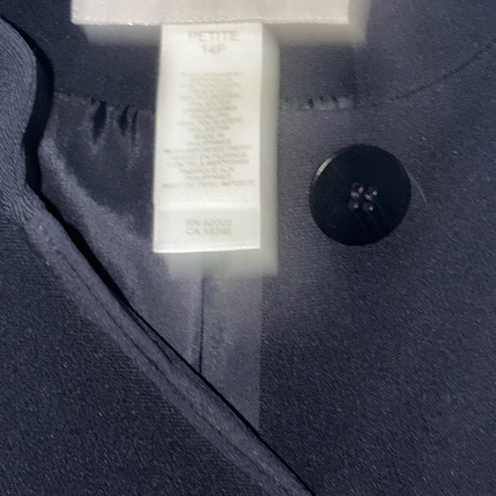 It is beautiful light jacket never been worn. The sleeve it’s not long.